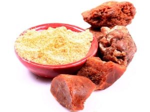  Asafoetida krydda i form av harts och pulver
